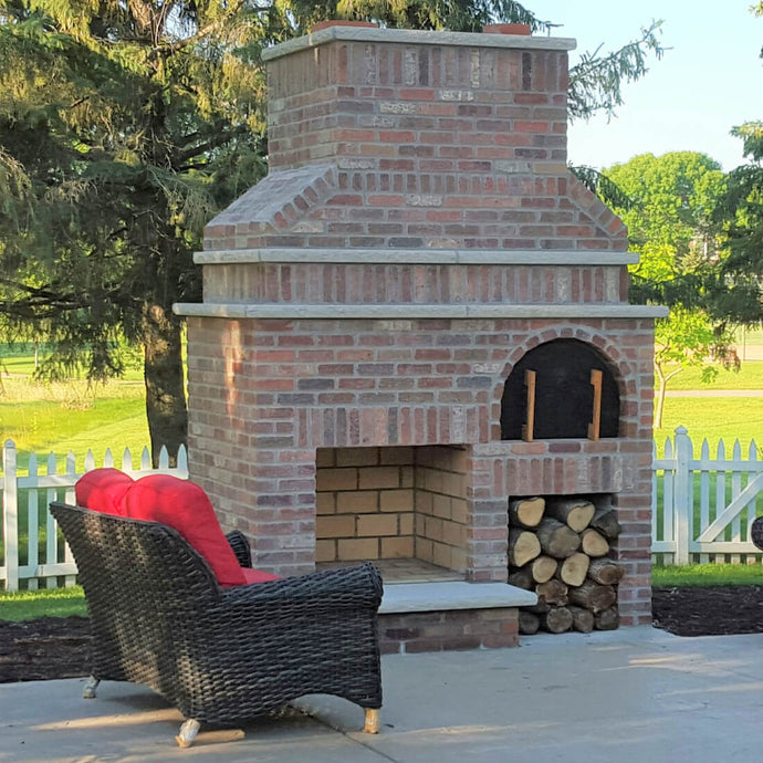 Outdoor Fireplace with Pizza Oven - A Perfect Red Brick Outdoor Oasis